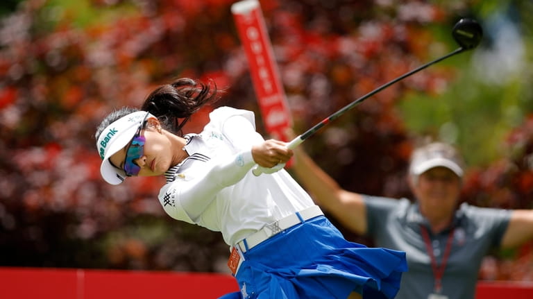 Jaravee Boonchant, of Thailand, tees off the 17th tee during...