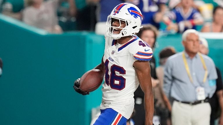 Buffalo Bills cornerback Ja'Marcus Ingram (46) reacts after scoring a...