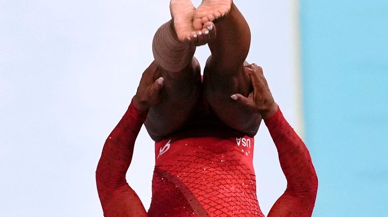 Simone Biles, of the United States, competes during the women's...