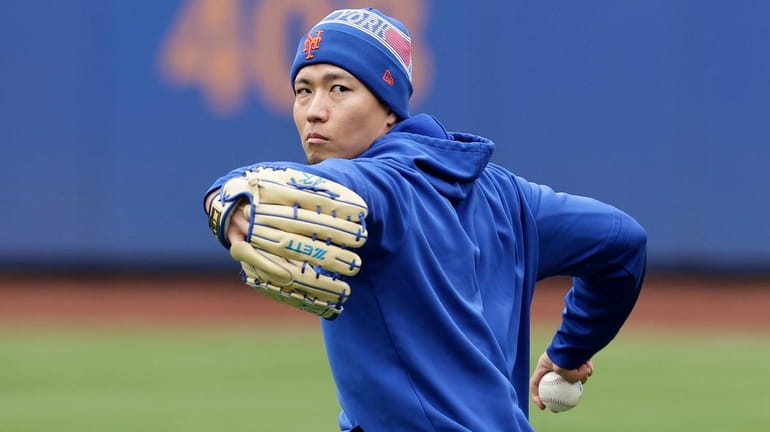 Kodai Senga of the Mets throws on the field during a...