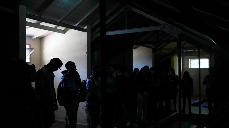 Students visit an area known as a "capucha," the Spanish...