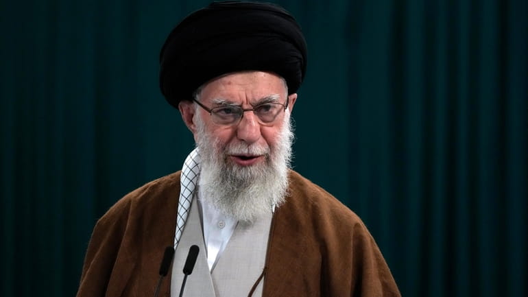 Iranian Supreme Leader Ayatollah Ali Khamenei speaks with media members...