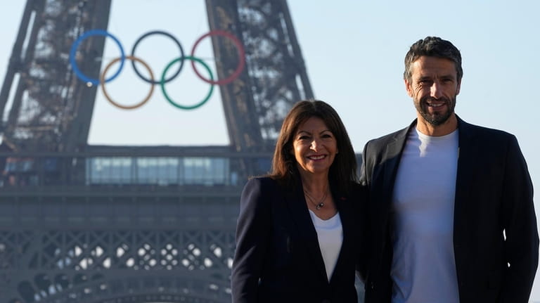 Paris mayor Anne Hidalgo and head of Paris 2024 Olympics...