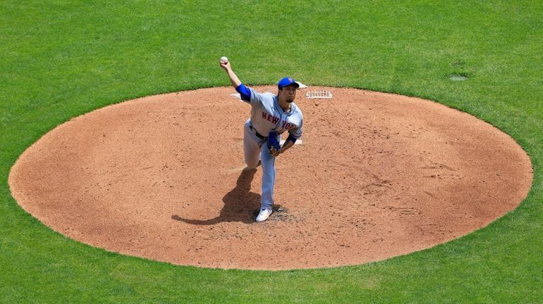 The Mets' Kodai Senga throws during the third inning against...