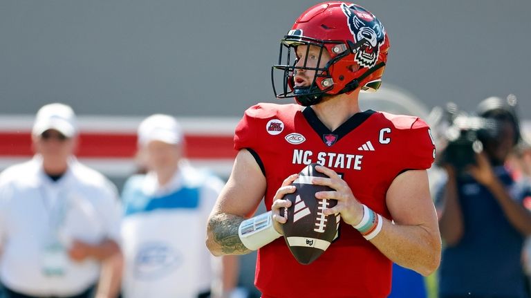 North Carolina State quarterback Brennan Armstrong (5) prepares to throw...