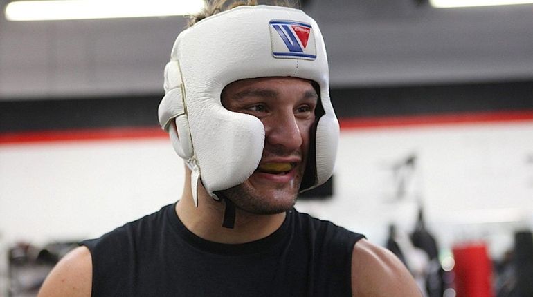 Gian Villante prepares to spar with Chris Weidman at Longo...