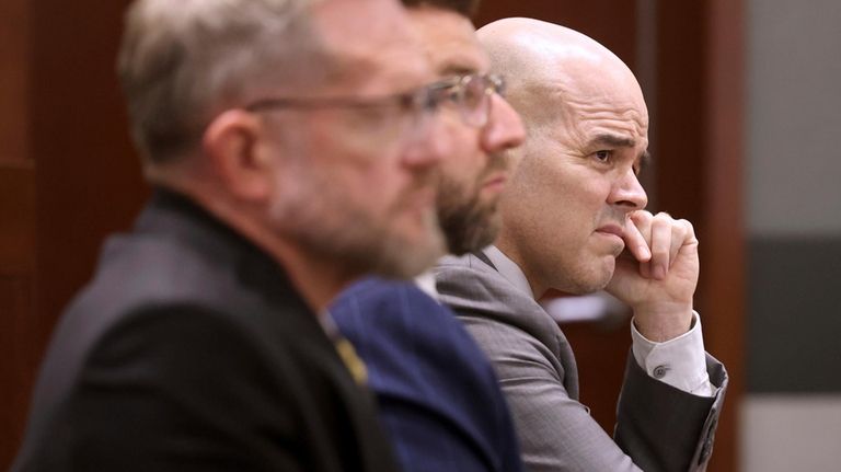 Robert Telles, right, a former Clark County public administrator charged...