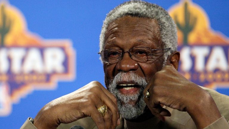 NBA great Bill Russell speaks during a news conference at...