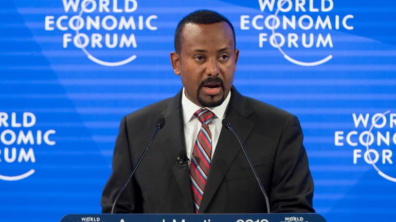 Ethiopian Prime Minister Abiy Ahmed Ali speaks during a panel...