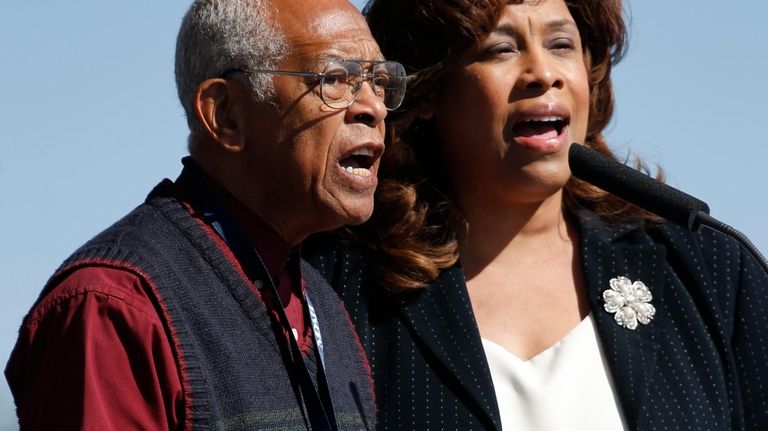 Hollis Watkins, left, chairman of the Veterans of the Mississippi...