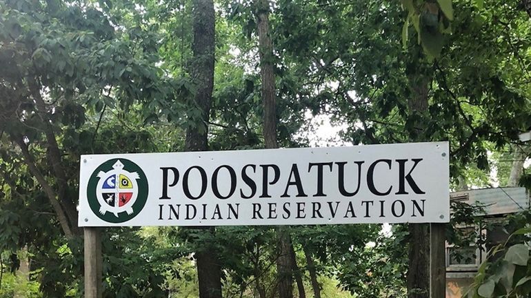 The leader of the Poospatuck reservation near Mastic has met recently with...