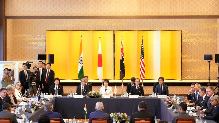 Japanese Foreign Minister Yoko Kamikawa, center, Australian Foreign Minister Penny...