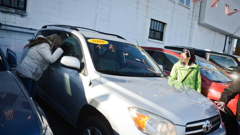 Mary Hebel, left, and her daughter Ashley, of Lindenhurst, look...