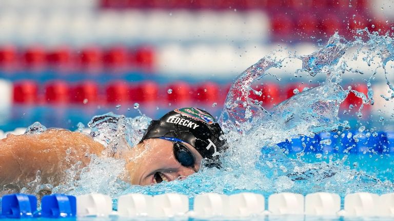 Katie Ledecky swims during the Women's 800 freestyle finals Saturday,...