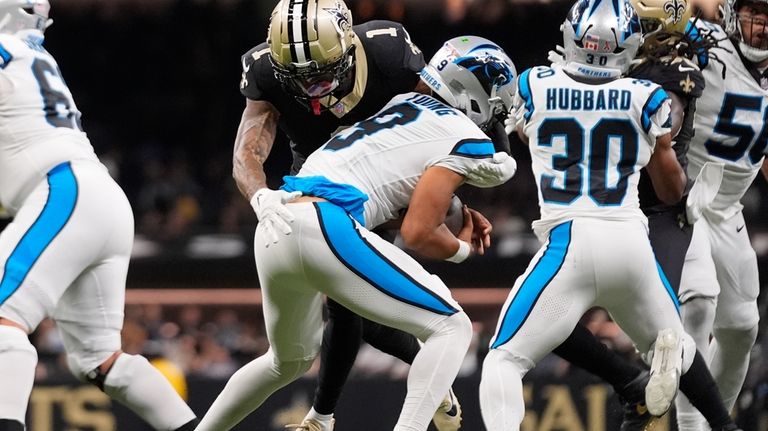 New Orleans Saints cornerback Alontae Taylor (1) sacks Carolina Panthers...