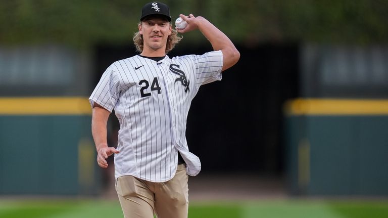 Chicago White Sox pitcher Hagen Smith throws out a ceremonial...