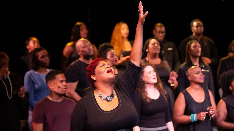 De-Rance Blaylock, center, and choir members in Theater of War...