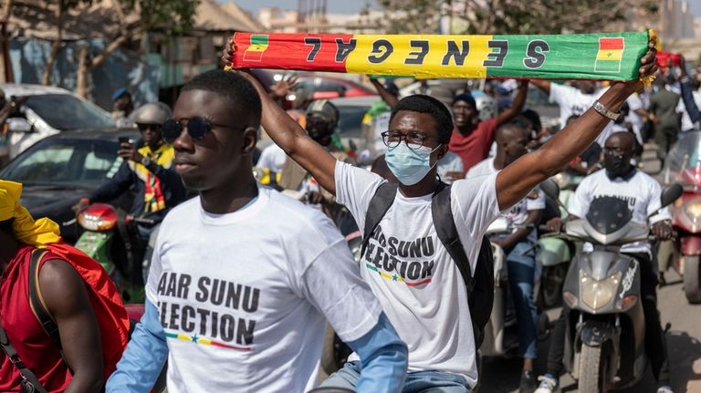 Supporters of the Aar Sunu Senegal opposition collective demonstrate on...