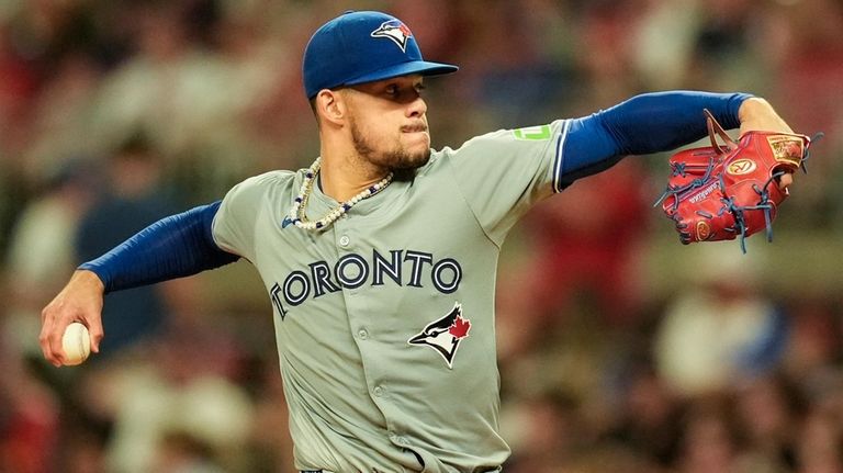 Toronto Blue Jays pitcher José Berríos (17) works against the...