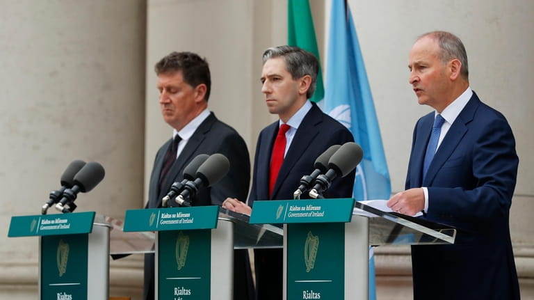 The three Irish Government leaders from left, Minister Eamon Ryan,...