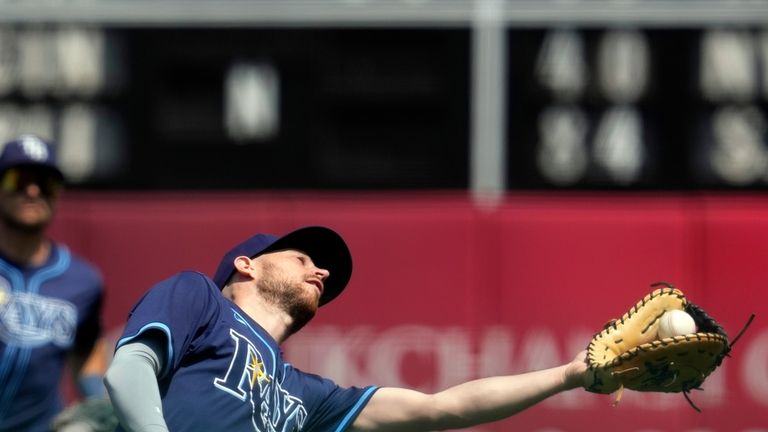 Tampa Bay Rays first baseman Brandon Lowe catches a popup...