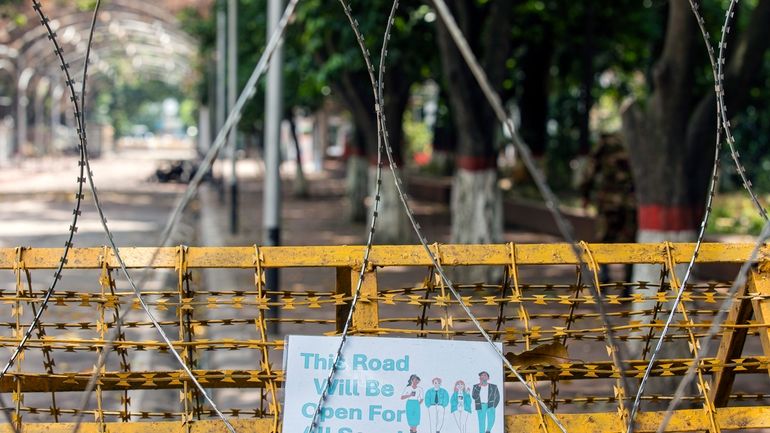 A sign saying 'This road will be open for all...