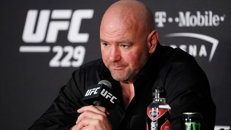 Dana White, president of UFC, speaks at a news conference...