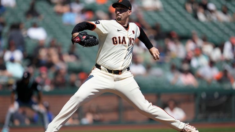 San Francisco Giants pitcher Blake Snell works against the Arizona...