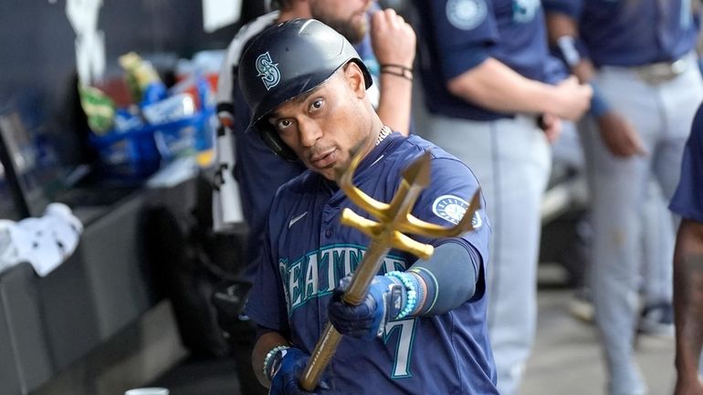 Seattle Mariners' Jorge Polanco celebrates his home run off Chicago...