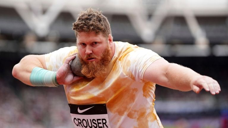 Ryan Crouser of the USA competes during the men's shot...