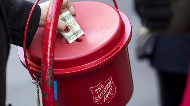 Salvation Army red kettles this year will accept Apple Pay...