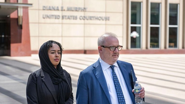 Ladan Mohamed Ali, left, a Seattle woman who attempted to...