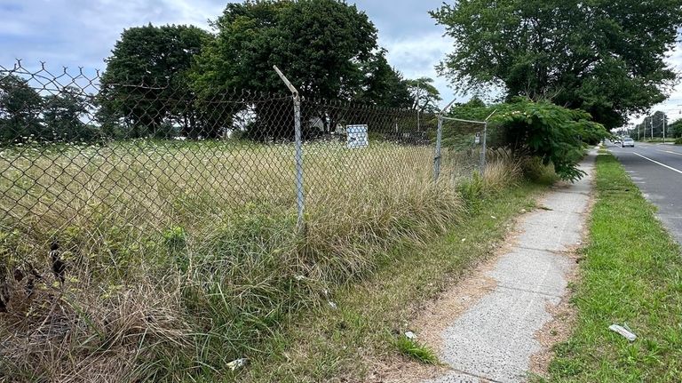 Vacant lot on northeast corner of Montauk Highway and Ecke...