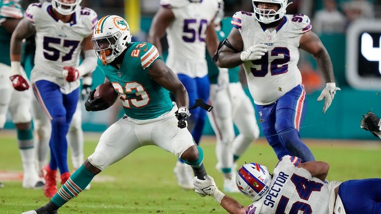 Buffalo Bills linebacker Baylon Spector (54) attempts to grab Miami...