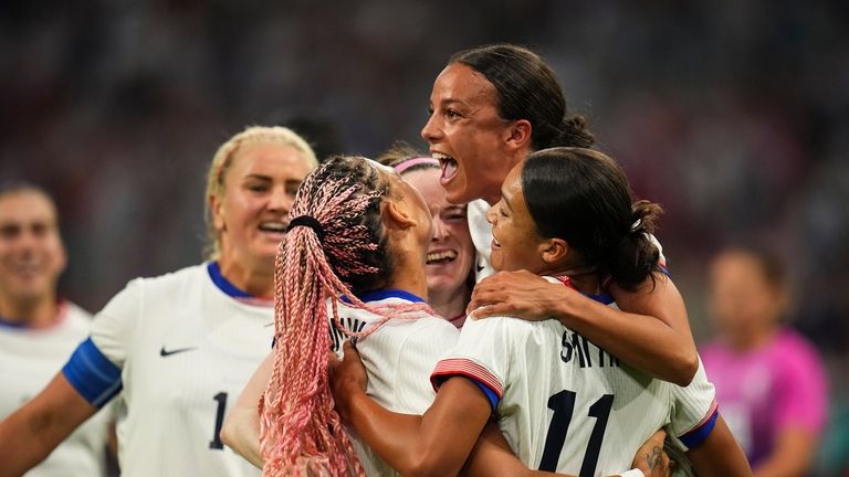 Players from the United States celebrate after Sophia Smith scored...