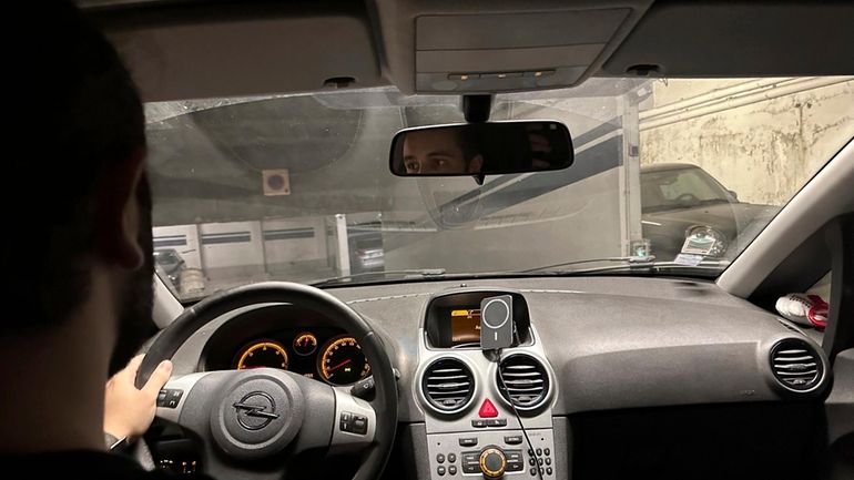 Amine, a 21-year-old student and apprentice bank worker, drives to...