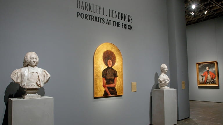 Artworks from the Barkley L. Hendricks exhibition are displayed on...