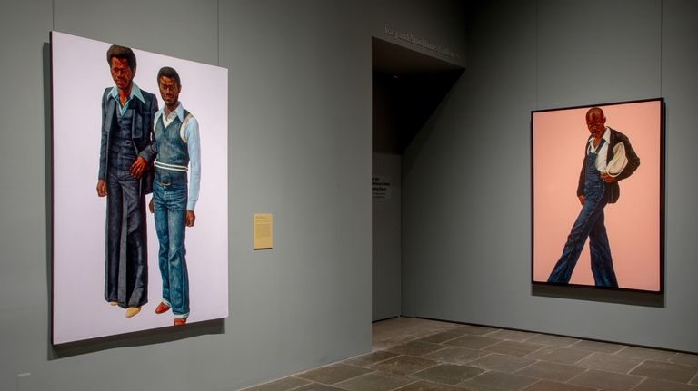 Artworks from the Barkley L. Hendricks exhibition are displayed on...