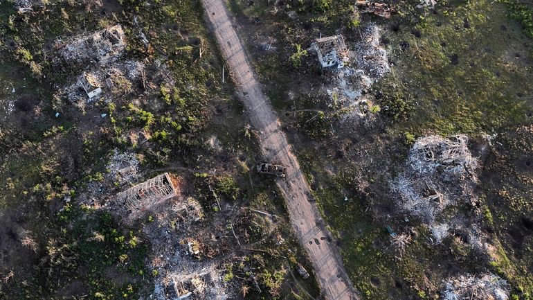 Houses and armoured vehicle destroyed during the fighting between Russian...