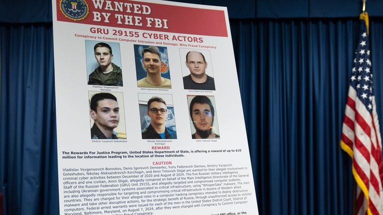 A graphic of the Russian suspects wanted by the FBI...