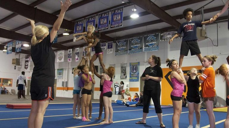 Coach Alisha Dunlap trains young cheer leaders in TLC's 'Cheer...