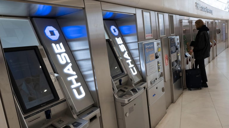 Chase Bank ATMs are shown, Thursday, March 25, 2021, in...