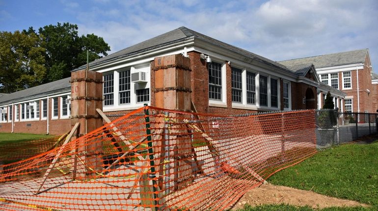 Work was halted on a fence at North Side Elementary...