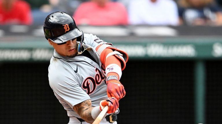 Detroit Tigers' Javier Báez hits a three-run home run during...