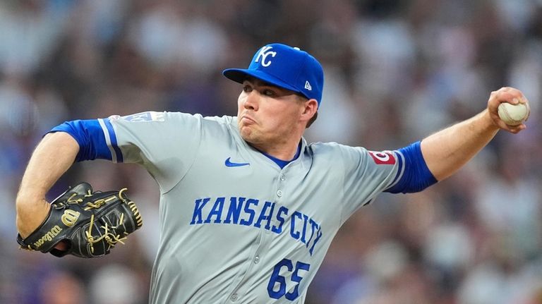 Kansas City Royals relief pitcher Walter Pennington works against the...