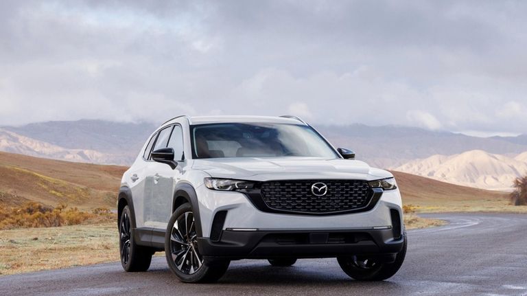 This photo provided by Mazda shows the 2025 CX-50. It...