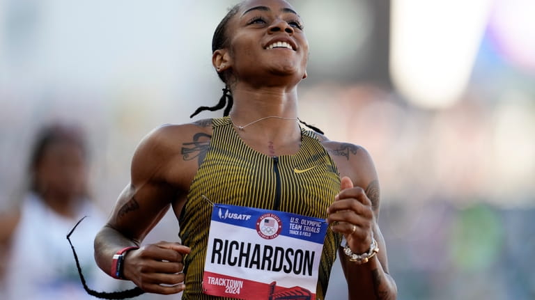 Sha'Carri Richardson wins a heat women's 200-meter semi-finals during the...