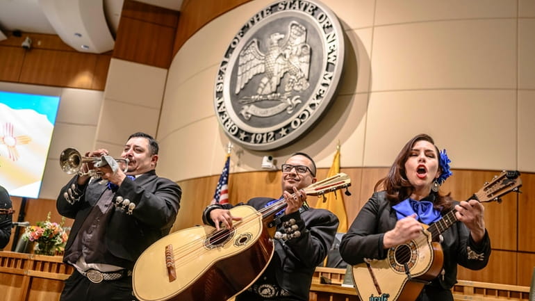 The Mariachi group called Euforia entertain lawmakers prior to the...