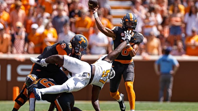 Tennessee quarterback Nico Iamaleava (8) throws a pass as he's...