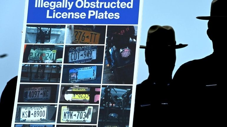 The MTA shows examples of illegally obstructed license plates at...